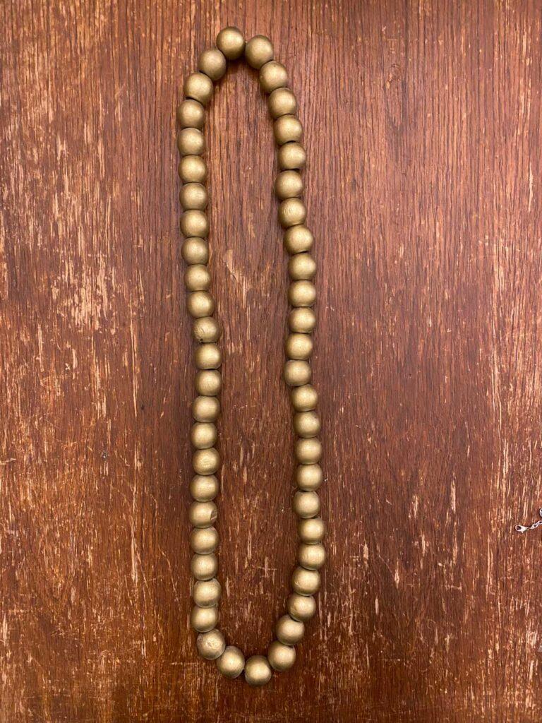 collier à grosses perles or