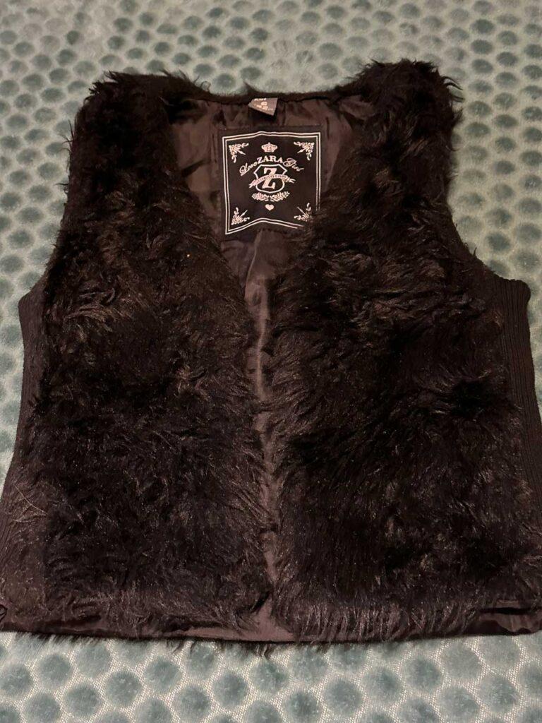 gilet fausse fourrure 6/7 ans