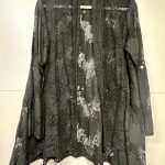 veste dentelle noire transparente