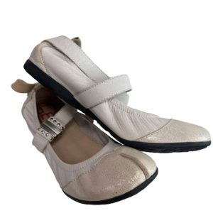 Ballerines en cuir blanc un matin d'été