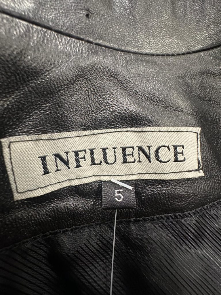 trench cuir noir influence seconde main friperie en ligne